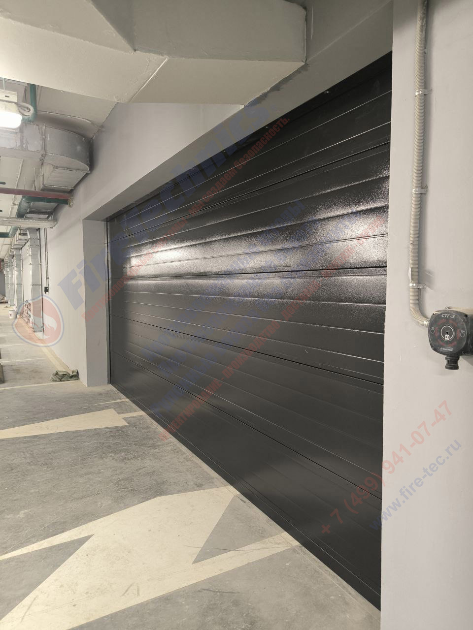 Секционные противопожарные ворота FireTechnics-S EI60 в паркинге ЖК